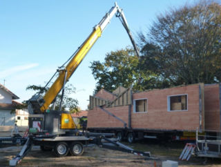 S713 - Louer une grue plutôt qu'un chariot élévateur pour la construction de maisons à ossature bois