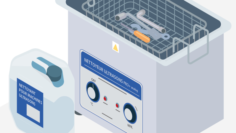 Nettoyer les outils recouverts de bitume avec une solution combinée ultrasons et huile biodégradable