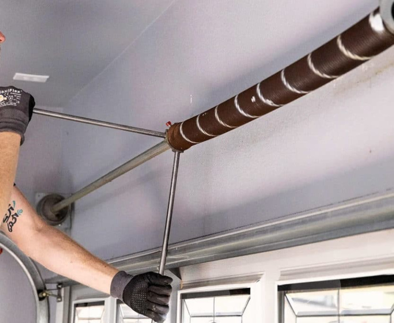 Barre de serrage de ressort