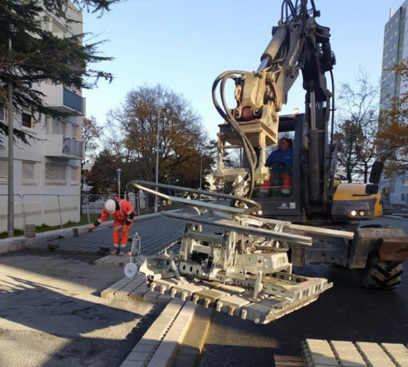 Pince à poser des pavés